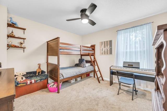 110 Sandis Ln, Palmyra, TN 37142 - carpeted bedroom with a ceiling fan and baseboards