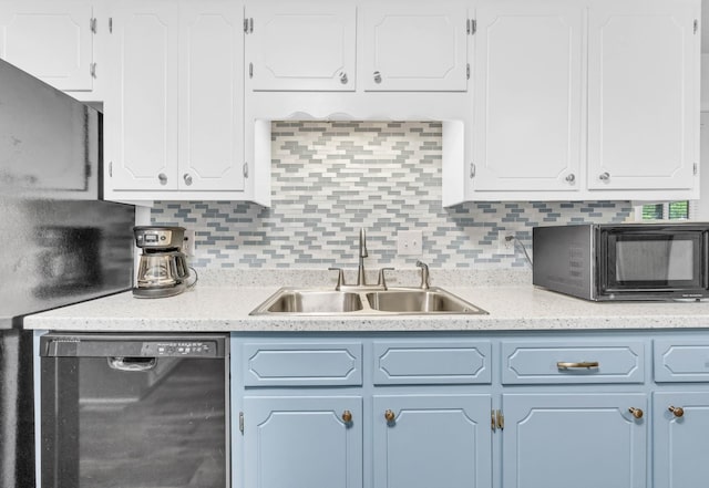 110 Sandis Ln, Palmyra, TN 37142 - kitchen with dishwashing machine, black microwave, light countertops, and white cabinetry