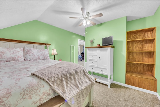 110 Sandis Ln, Palmyra, TN 37142 - carpeted bedroom featuring vaulted ceiling, a ceiling fan, and a textured ceiling