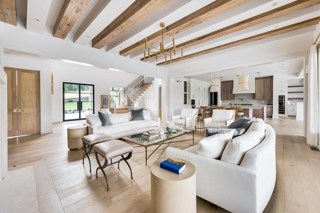 1713 Reflection Ln, Brentwood, TN 37027 - living area with beamed ceiling, light wood-type flooring, and stairway