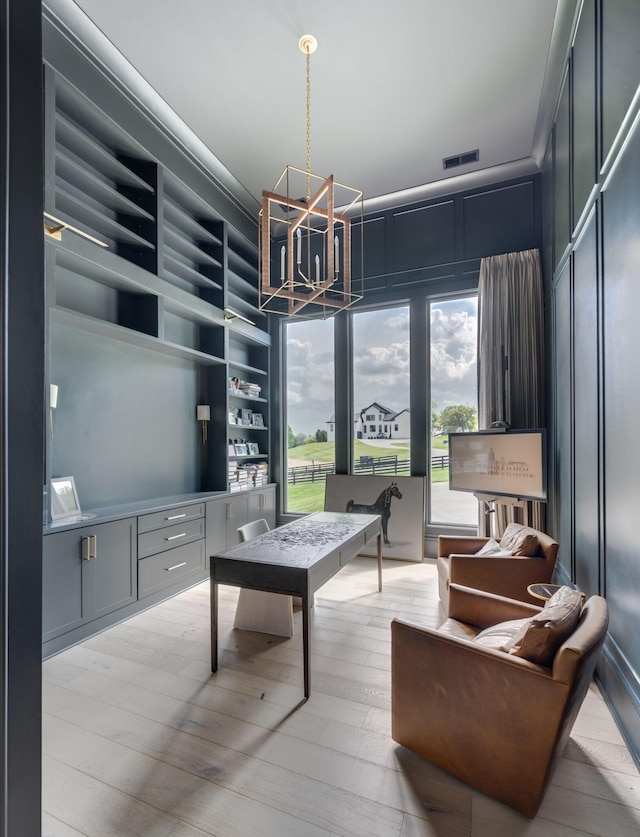1713 Reflection Ln, Brentwood, TN 37027 - office space featuring a chandelier, wood finished floors, and built in features