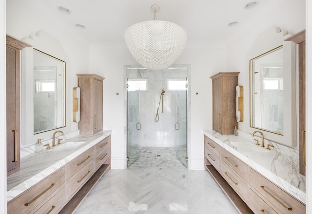 1713 Reflection Ln, Brentwood, TN 37027 - full bathroom featuring healthy amount of natural light, a shower stall, two vanities, and crown molding