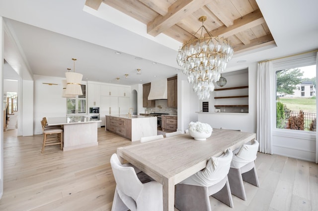 1713 Reflection Ln, Brentwood, TN 37027 - dining space featuring light wood-style floors, a wooden ceiling with exposed beams, and a chandelier
