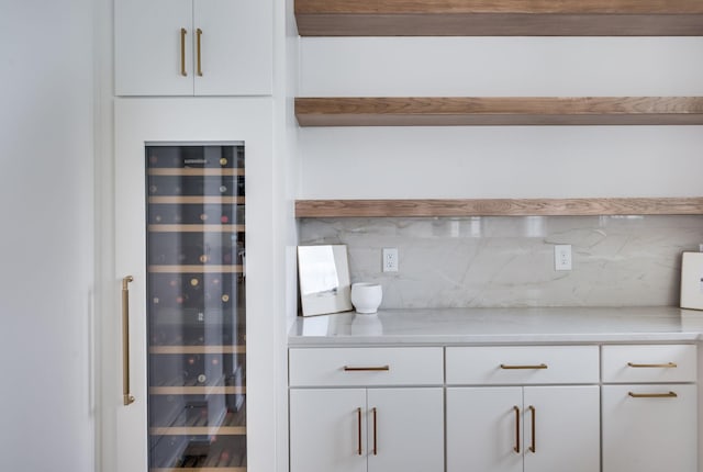 1713 Reflection Ln, Brentwood, TN 37027 - bar featuring wine cooler and backsplash