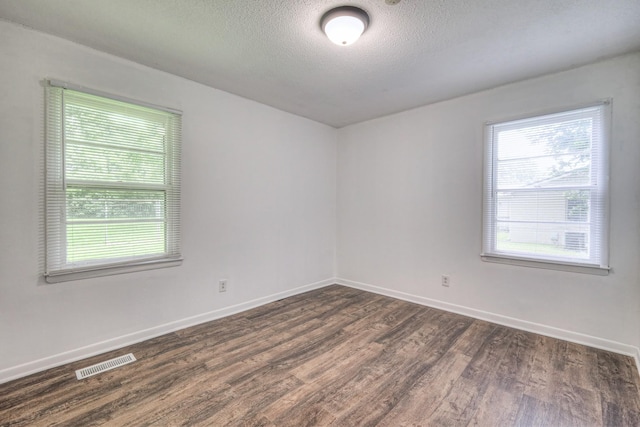 131 Clauson Dr, Columbia, TN 38401 - empty room with dark wood-type flooring and a textured ceiling
