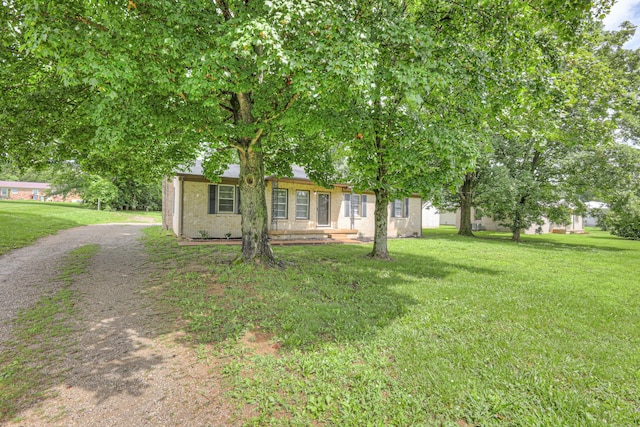 131 Clauson Dr, Columbia, TN 38401 - view of front of property with a front lawn, driveway, and brick siding