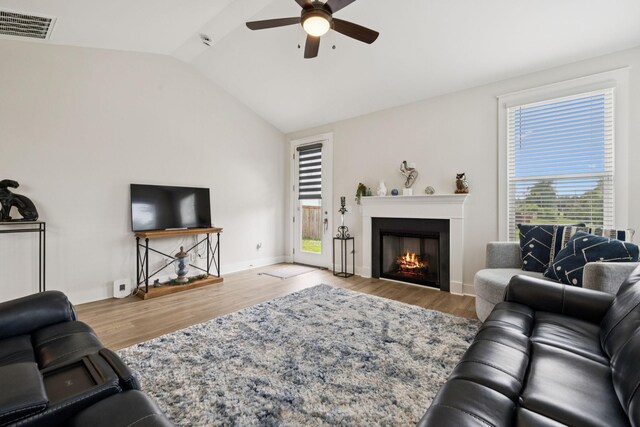 3737 Felipe Way, Murfreesboro, TN 37129 - living room with ceiling fan, lofted ceiling, a lit fireplace, and wood finished floors