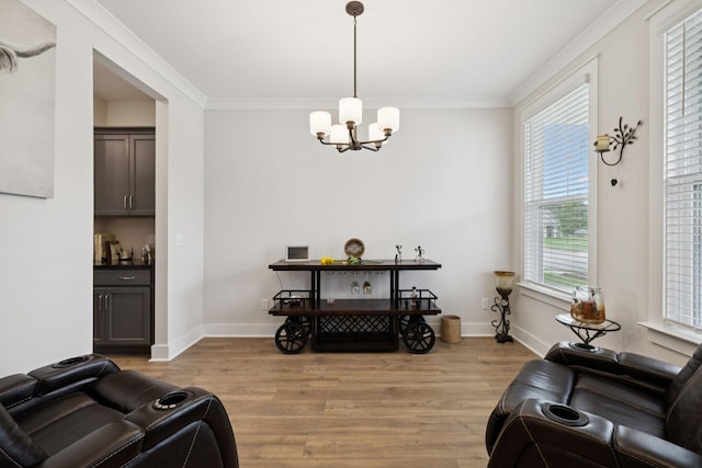 3737 Felipe Way, Murfreesboro, TN 37129 - living area with light wood-type flooring, a chandelier, and ornamental molding