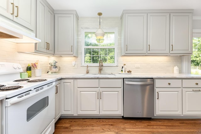 1028 Ridgecrest Dr, Franklin, TN 37069 - kitchen with white range with electric cooktop, stainless steel dishwasher, decorative backsplash, and custom exhaust hood
