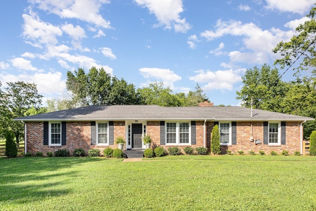 1028 Ridgecrest Dr, Franklin, TN 37069 - ranch-style house featuring brick siding, a front yard, and a chimney