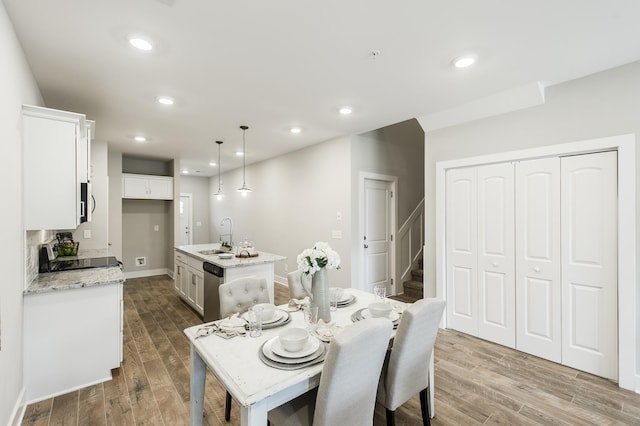 1144 Lock 4 Rd Unit B-4, Gallatin, TN 37066 - dining space featuring wood finished floors, stairway, and recessed lighting