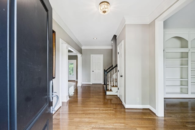 1524 Gordon Petty Dr, Brentwood, TN 37027 - entrance foyer with wood finished floors, stairs, ornamental molding, and recessed lighting