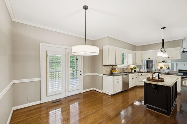 1524 Gordon Petty Dr, Brentwood, TN 37027 - kitchen featuring dishwasher, dark wood finished floors, white cabinetry, tasteful backsplash, and ornamental molding