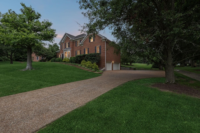 1524 Gordon Petty Dr, Brentwood, TN 37027 - view of front of property featuring driveway, brick siding, and a front lawn