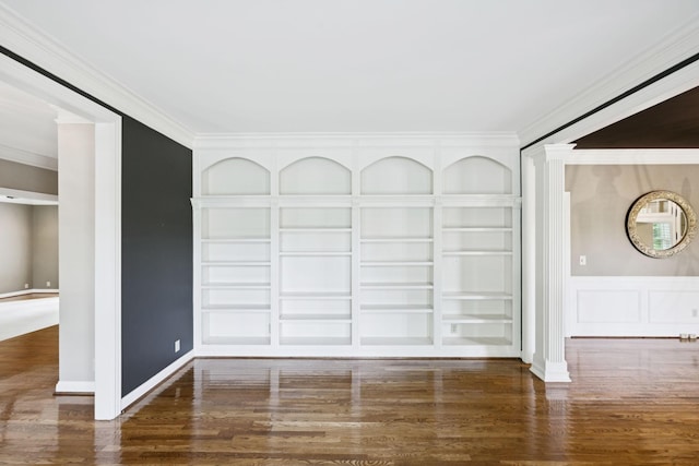 1524 Gordon Petty Dr, Brentwood, TN 37027 - empty room with wood finished floors, crown molding, built in shelves, and ornate columns
