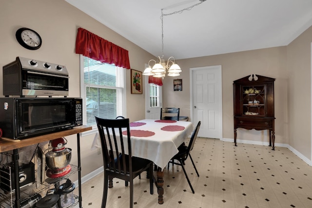 105 Plain View Dr, Estill Springs, TN 37330 - dining area featuring light floors and a chandelier