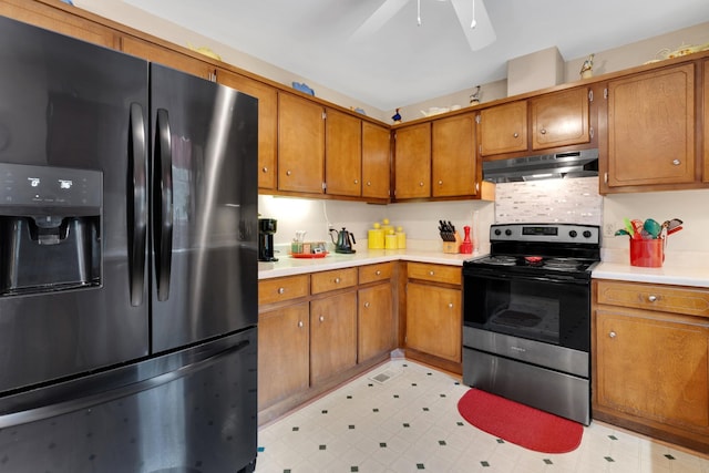 105 Plain View Dr, Estill Springs, TN 37330 - kitchen featuring black refrigerator with ice dispenser, under cabinet range hood, electric stove, brown cabinets, and light countertops