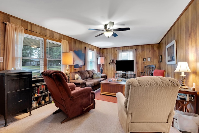 105 Plain View Dr, Estill Springs, TN 37330 - living area featuring wooden walls, a ceiling fan, and light colored carpet