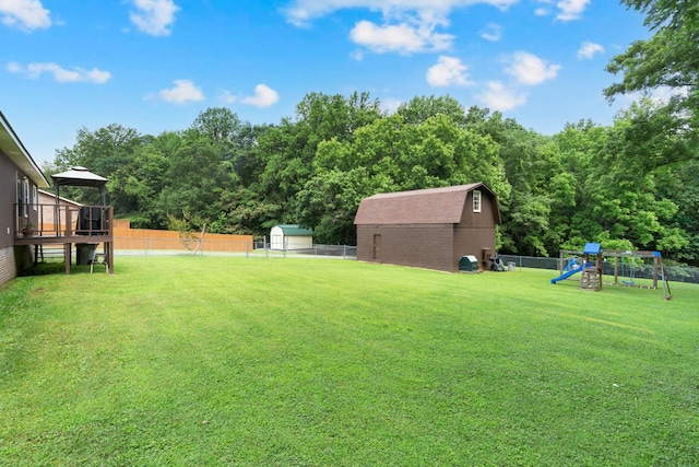 105 Plain View Dr, Estill Springs, TN 37330 - fenced backyard featuring a playground, a gazebo, and a storage shed