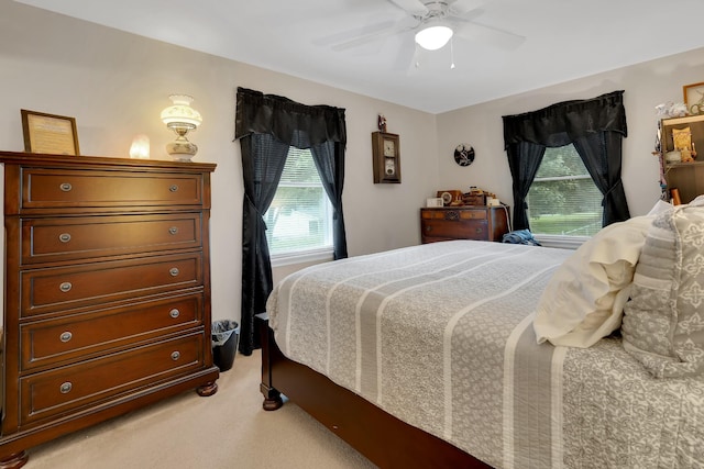 105 Plain View Dr, Estill Springs, TN 37330 - bedroom with multiple windows, light colored carpet, and ceiling fan