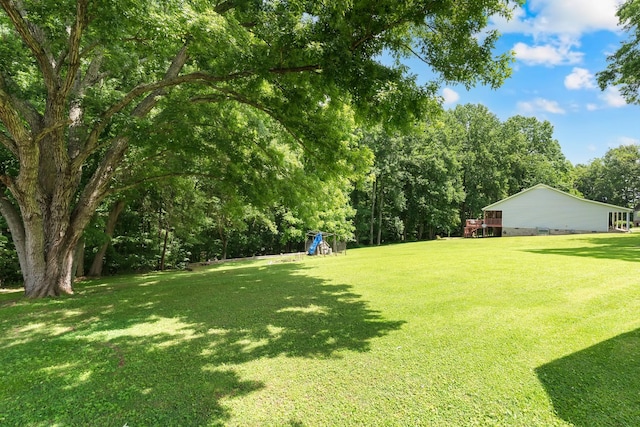 105 Plain View Dr, Estill Springs, TN 37330 - view of green lawn featuring a playground