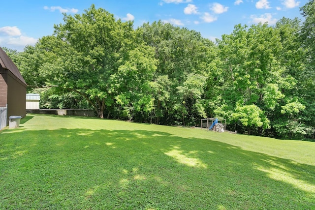 105 Plain View Dr, Estill Springs, TN 37330 - view of grassy yard with view of wooded area