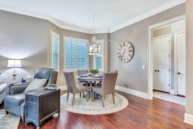 2811 Craythorne Dr, Murfreesboro, TN 37129 - dining area featuring a chandelier, dark wood-type flooring, and crown molding