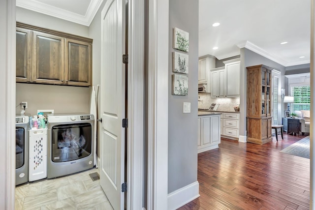 2811 Craythorne Dr, Murfreesboro, TN 37129 - washroom featuring ornamental molding, washer and clothes dryer, light wood-type flooring, and recessed lighting