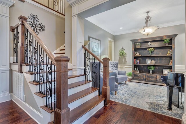 2811 Craythorne Dr, Murfreesboro, TN 37129 - staircase with a decorative wall, wood finished floors, crown molding, wainscoting, and recessed lighting