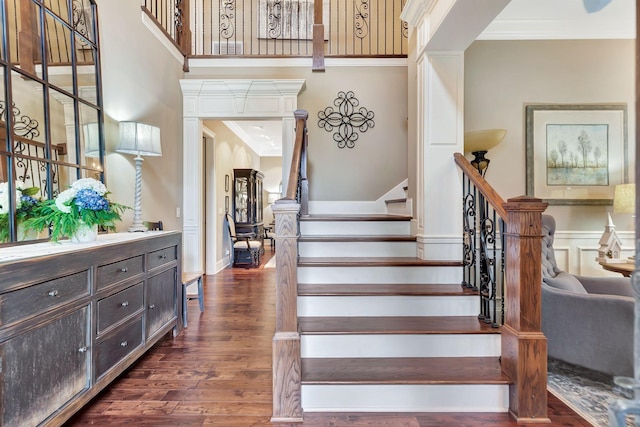 2811 Craythorne Dr, Murfreesboro, TN 37129 - stairway with crown molding, wood finished floors, and wainscoting