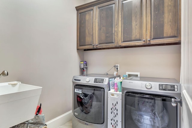2811 Craythorne Dr, Murfreesboro, TN 37129 - laundry area featuring washing machine and dryer and cabinet space