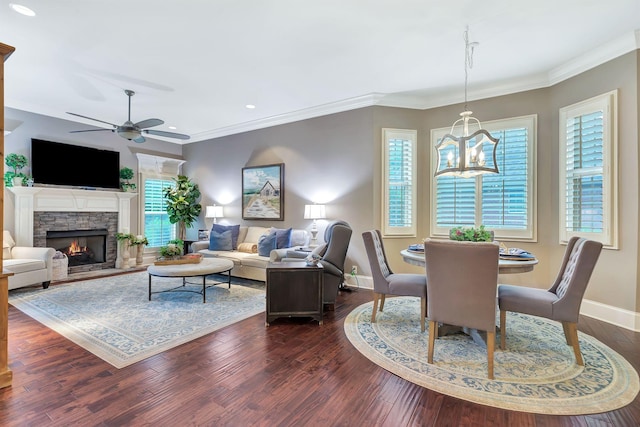 2811 Craythorne Dr, Murfreesboro, TN 37129 - living room with ceiling fan, a stone fireplace, dark wood finished floors, recessed lighting, and crown molding