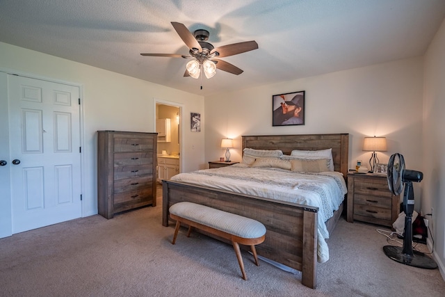 545 Kent St, Lawrenceburg, TN 38464 - bedroom with light colored carpet, ensuite bath, and a ceiling fan