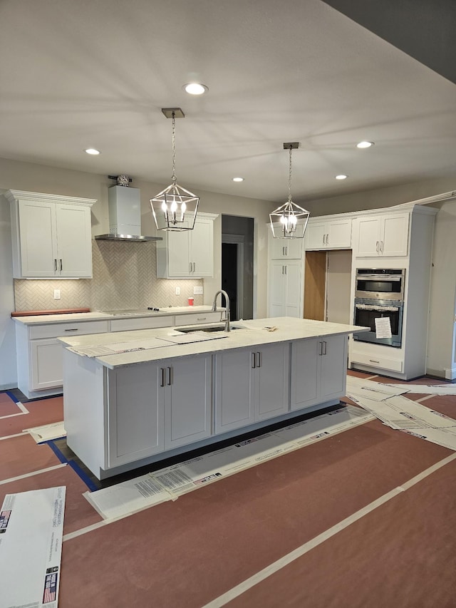 2895 Cooper Creek Rd, Woodlawn, TN 37191 - kitchen featuring wall chimney range hood, stainless steel double oven, white cabinets, and recessed lighting
