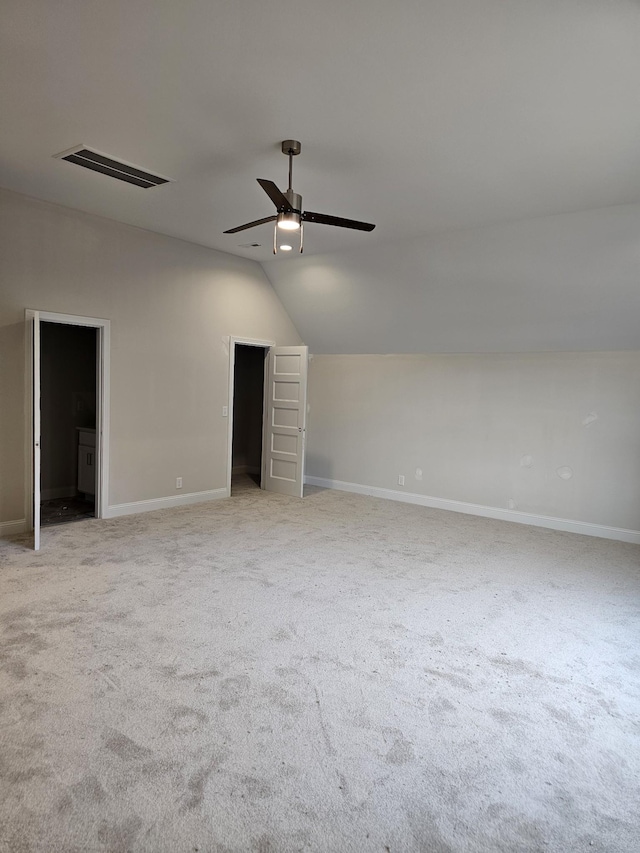 2895 Cooper Creek Rd, Woodlawn, TN 37191 - carpeted spare room with vaulted ceiling and ceiling fan
