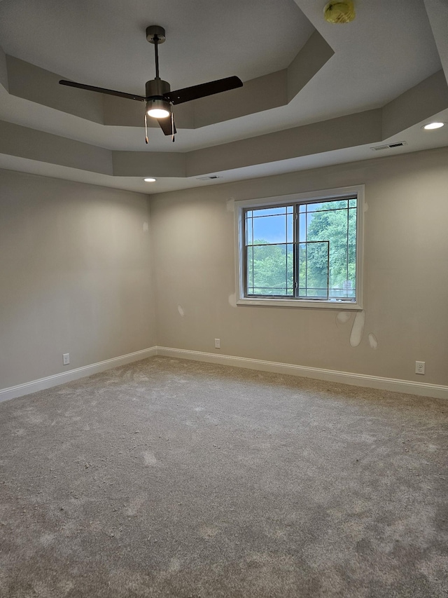 2895 Cooper Creek Rd, Woodlawn, TN 37191 - carpeted spare room with a tray ceiling, ceiling fan, a smoke detector, and recessed lighting