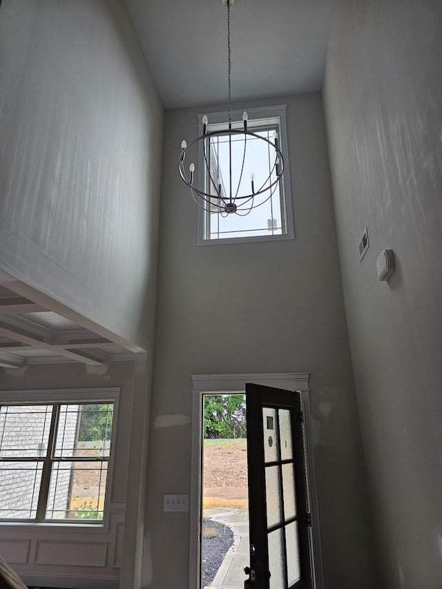 2895 Cooper Creek Rd, Woodlawn, TN 37191 - detailed view of a chandelier and beamed ceiling