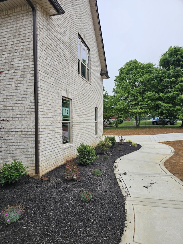 2895 Cooper Creek Rd, Woodlawn, TN 37191 - view of side of property with brick siding