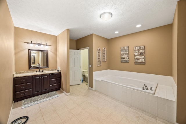 5546 Old Kentucky Rd, Byrdstown, TN 38549 - full bathroom with a garden tub, vanity, a textured ceiling, tile patterned floors, and recessed lighting