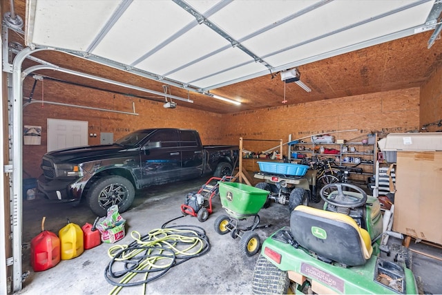 5546 Old Kentucky Rd, Byrdstown, TN 38549 - garage featuring a garage door opener