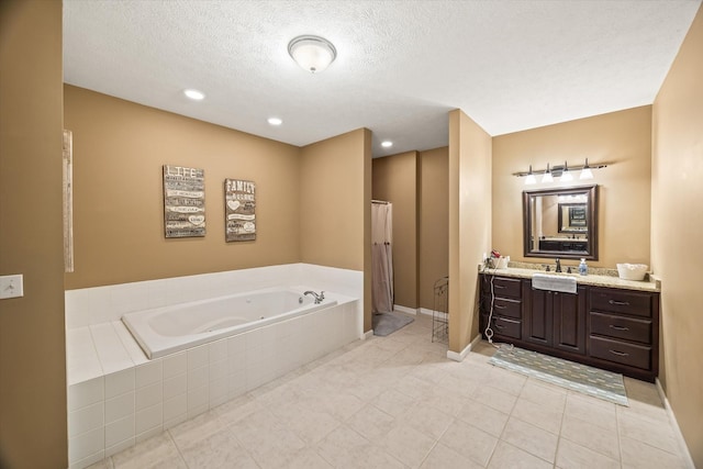 5546 Old Kentucky Rd, Byrdstown, TN 38549 - bathroom with a whirlpool tub, vanity, tile patterned floors, a textured ceiling, and recessed lighting