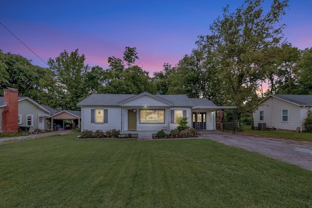 1519 Graybar Ln, Murfreesboro, TN 37129 - bungalow featuring driveway, a yard, a carport, and a chimney