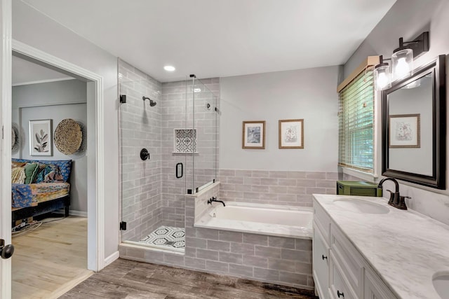 1519 Graybar Ln, Murfreesboro, TN 37129 - full bath with a bath, wood finished floors, a stall shower, connected bathroom, and double vanity