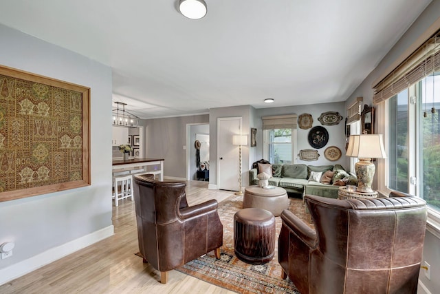 1519 Graybar Ln, Murfreesboro, TN 37129 - living area featuring light wood-style floors and a chandelier