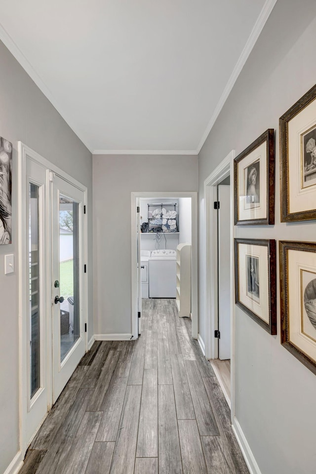 1519 Graybar Ln, Murfreesboro, TN 37129 - corridor featuring washer and dryer, wood finished floors, and ornamental molding