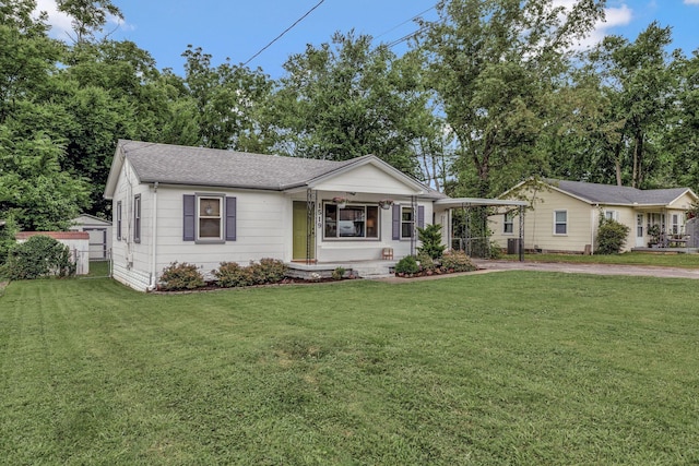 1519 Graybar Ln, Murfreesboro, TN 37129 - ranch-style house with concrete driveway, a carport, and a shingled roof