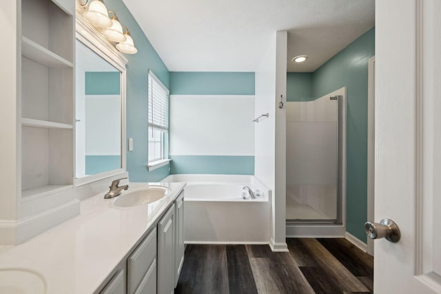 7607 Birdsong Ct, Fairview, TN 37062 - full bathroom featuring double vanity, a garden tub, wood finished floors, and a shower stall