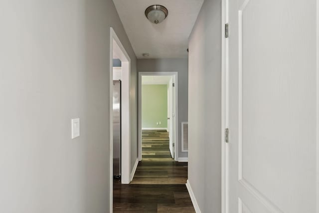 7607 Birdsong Ct, Fairview, TN 37062 - hall with dark wood finished floors and baseboards