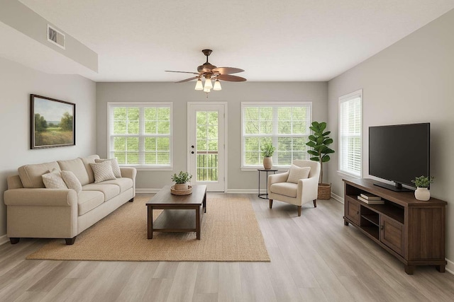 7607 Birdsong Ct, Fairview, TN 37062 - living area featuring light wood-style flooring and a ceiling fan