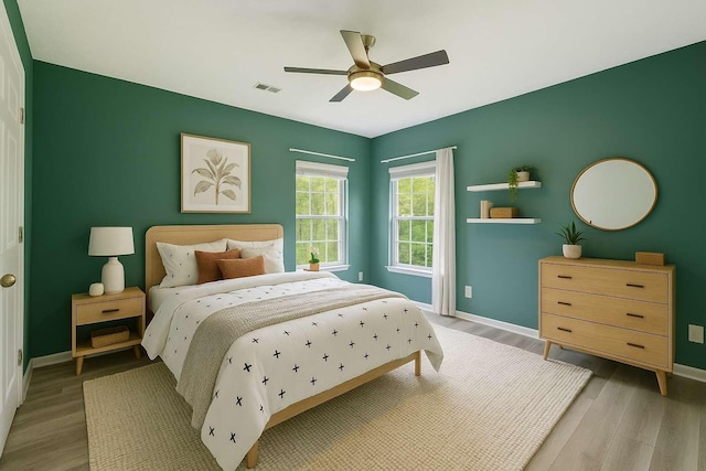 7607 Birdsong Ct, Fairview, TN 37062 - bedroom featuring light wood finished floors and a ceiling fan